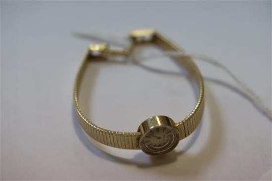 A ladys 14k gold Rolex manual wind wrist watch,
